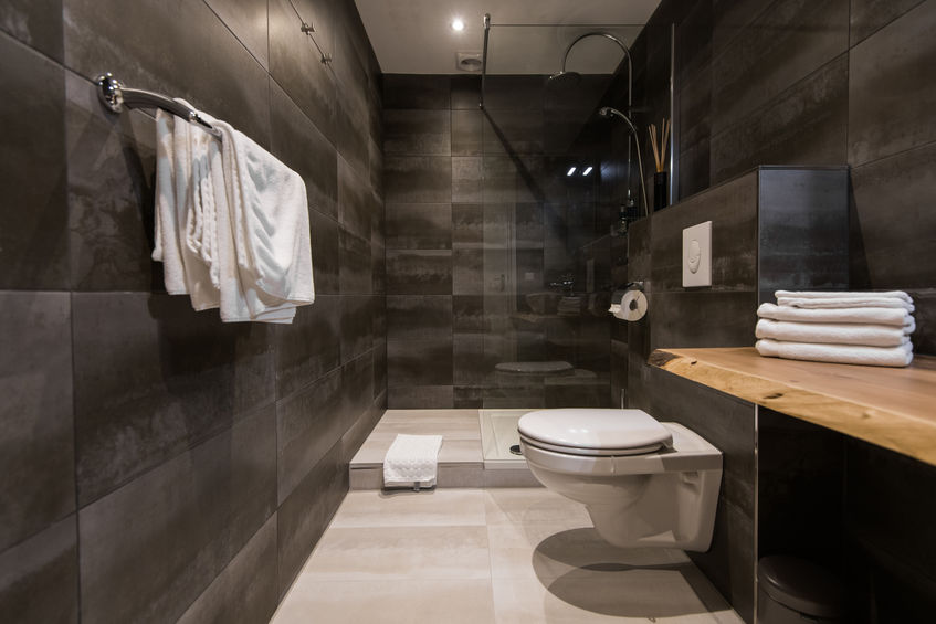 modern bathroom remodel with black tile