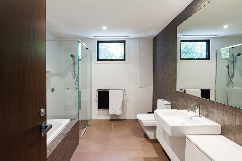 Contemporary brown natural tones family bathroom in modern home