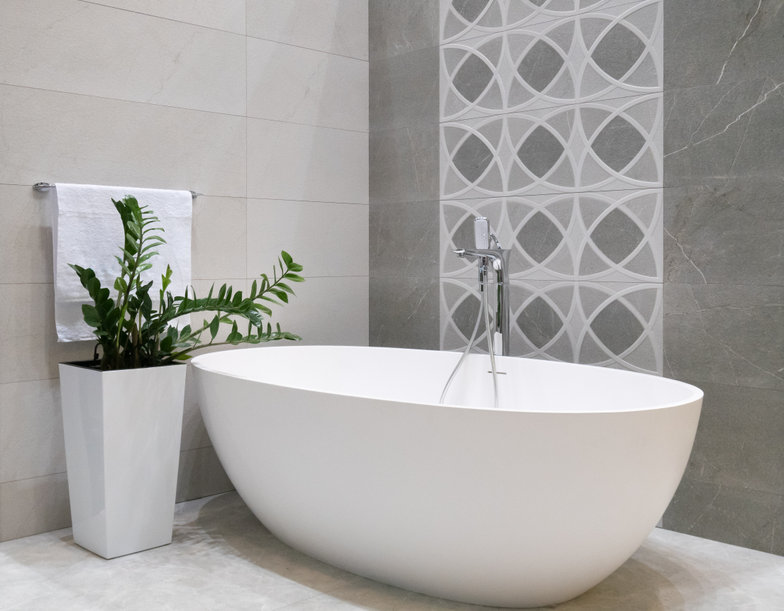 modern bathroom interior design with white stone bathtub