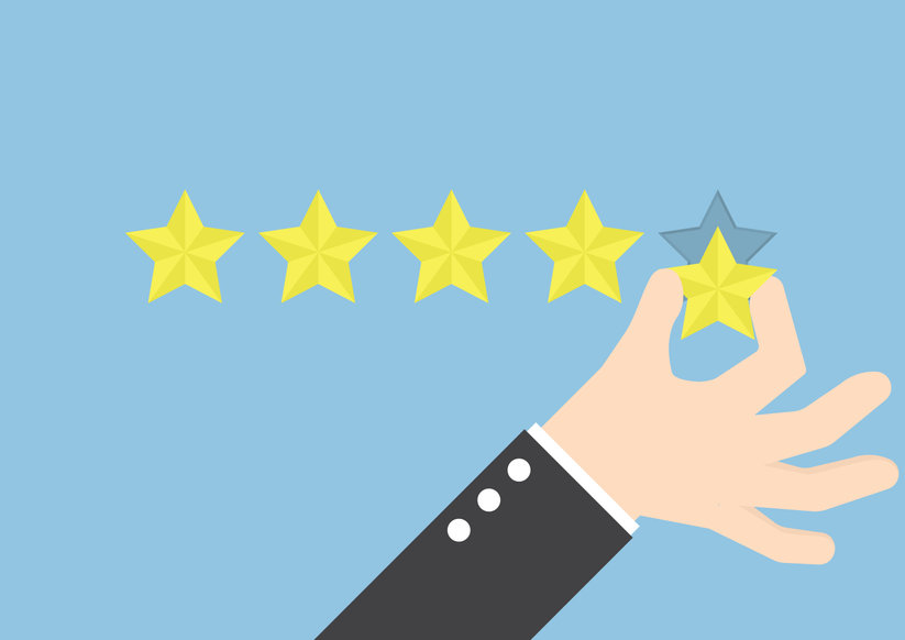 Businessman hand giving five star rating
