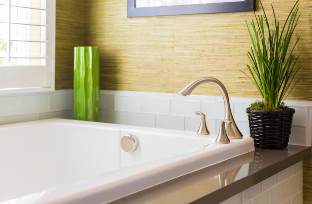 Beautiful New Modern Bathtub, Faucet and Subway Tiles.